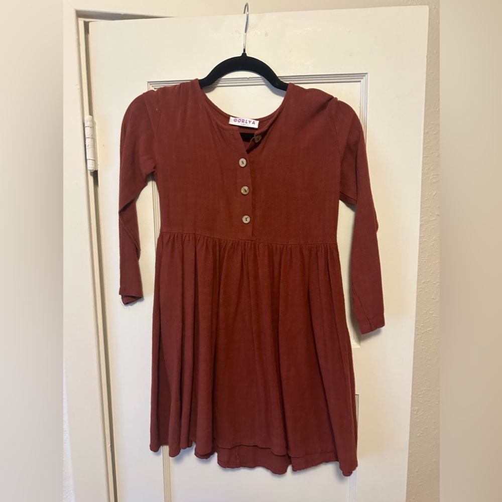 Kids size 12! Can be used as a dress or pair with leggings or jeans.